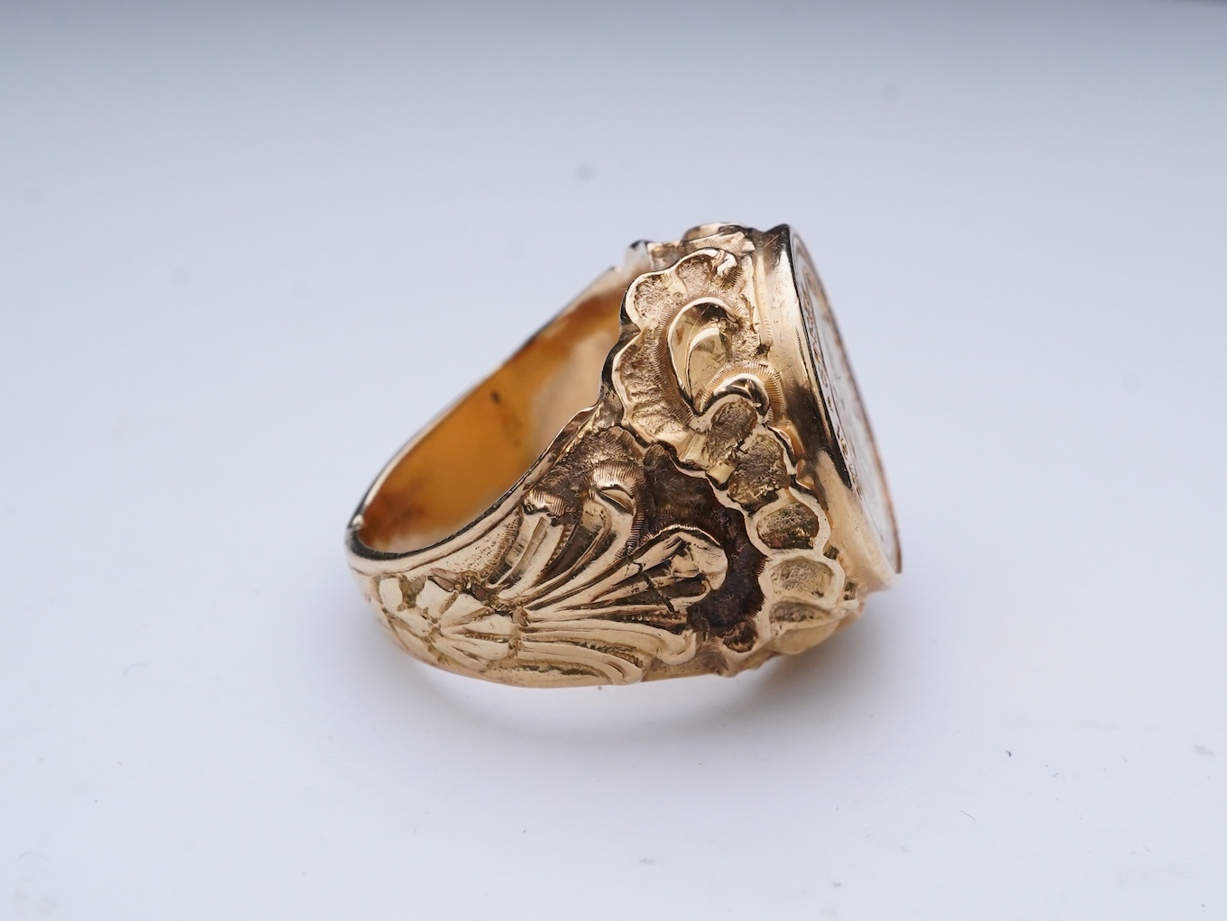 A gold peso coin ring